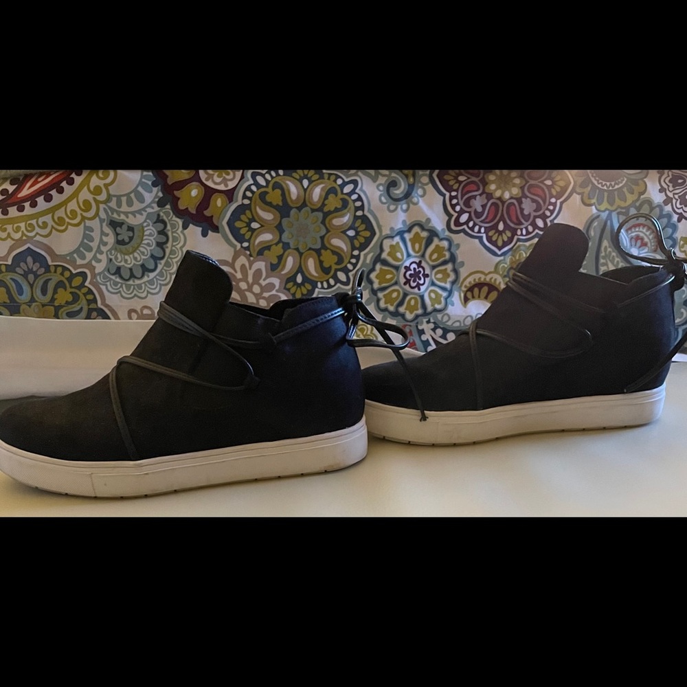 Black slip on high top sneakers